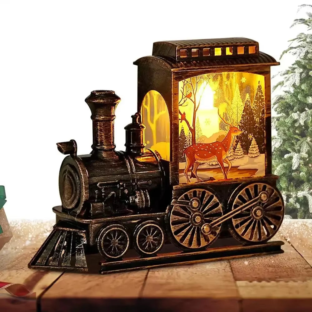 Train Magique Bronze, modèle renne, éclairé par une lumière chaude